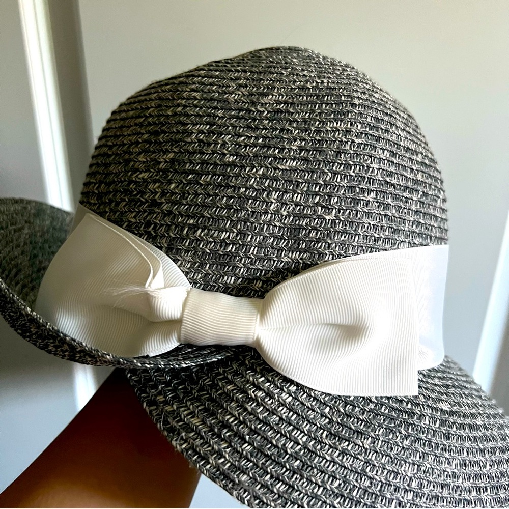 Gorgeous wide brim hat with white ribbon and bow detail